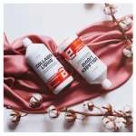 Collagen liquid 1000 ml. Both flavours on a red scarf and by BioTechUSA